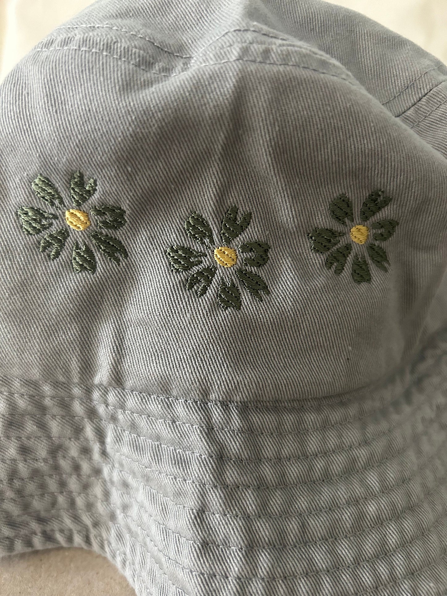 Bucket hat with embroidered flowers